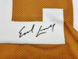 TEXAS LONGHORNS EARL CAMPBELL AUTOGRAPHED SIGNED ORANGE JERSEY JSA STOCK #228965