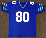 SEATTLE SEAHAWKS STEVE LARGENT AUTOGRAPHED BLUE JERSEY "HOF 95" BECKETT 124674