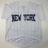 Autographed/Signed Yogi Berra New York Pinstripe Baseball Jersey JSA COA