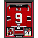 Framed Autographed/Signed Taylor Hall 35x39 New Jersey Red Hockey Jersey JSA COA