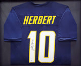 CHARGERS JUSTIN HERBERT AUTOGRAPHED FRAMED BLUE JERSEY BECKETT 200923