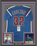 FRAMED Autographed/Signed STEVE CARLTON 33x42 Philadelphia Blue Jersey JSA COA