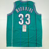 Autographed/Signed Alonzo Mourning Charlotte Teal Basketball Jersey JSA COA