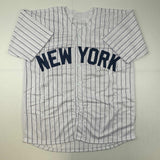 Autographed/Signed Jorge Posada New York Pinstripe Jersey Beckett BAS COA