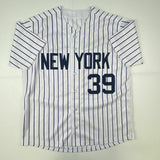 Autographed/Signed DARRYL STRAWBERRY New York Pinstripe Baseball Jersey JSA COA