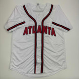 Autographed/Signed Marcell Ozuna Atlanta White Baseball Jersey Beckett BAS COA