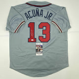 Autographed/Signed RONALD ACUNA JR. Atlanta Grey Baseball Jersey JSA COA Auto