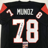 Autographed/Signed Anthony Munoz HOF 98 Cincinnati Black Football Jersey JSA COA