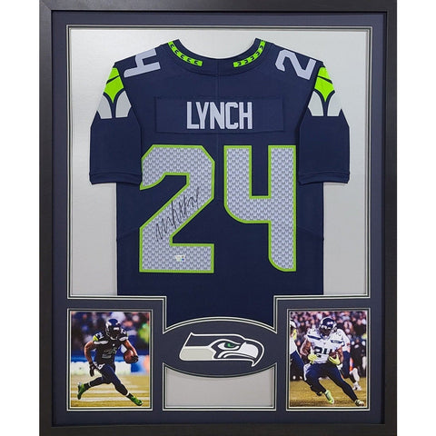 Marshawn Lynch Autographed Signed Framed Navy Seahawks Jersey FANATICS