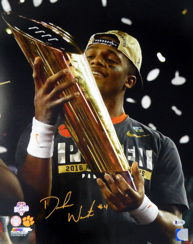 DESHAUN WATSON AUTOGRAPHED 16X20 PHOTO HOLDING TROPHY CLEMSON BECKETT 117276