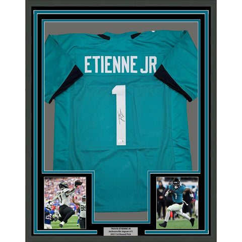 Framed Autographed/Signed Travis Etienne Jr. 35x39 Teal Jersey Beckett BAS COA