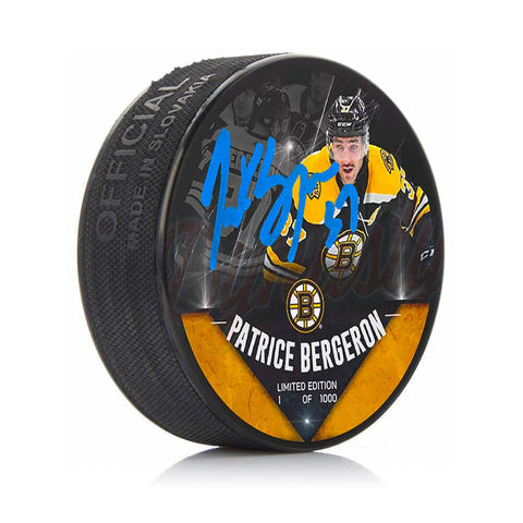 Patrice Bergeron Boston Bruins Autographed Player Photo Hockey Puck JSA PSA