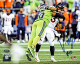 UCHENNA NWOSU AUTOGRAPHED 8X10 PHOTO HIT ON RUSSELL WILSON SEAHAWKS MCS 211040