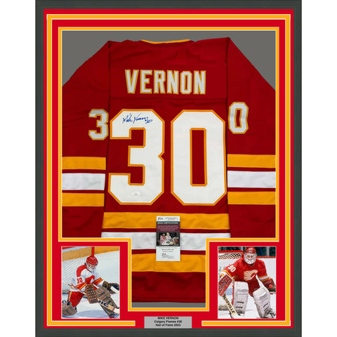 Framed Autographed/Signed Mike Vernon 35x39 Calgary Red Hockey Jersey JSA COA